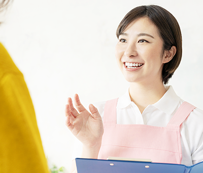 Image of smiling female staff